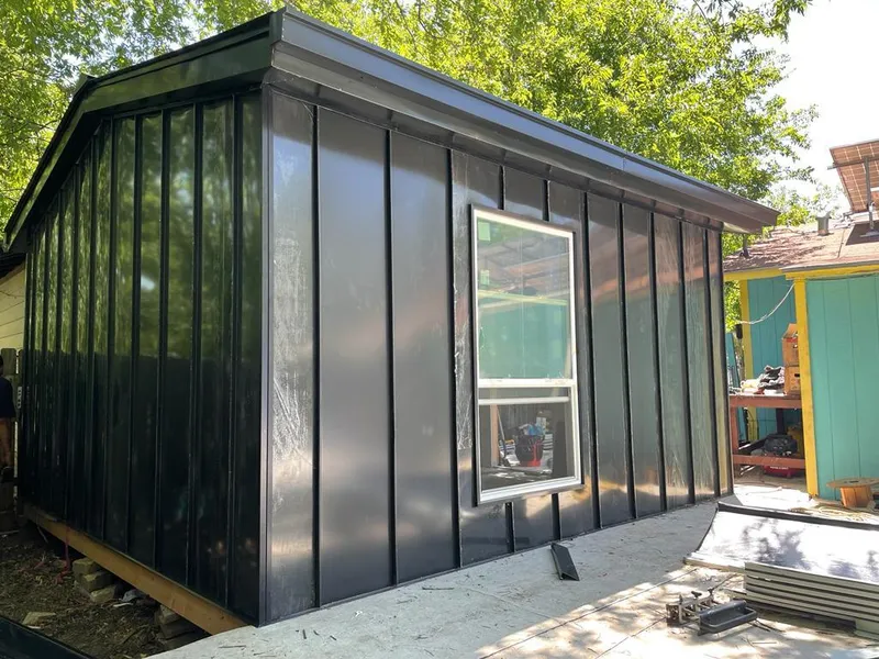 Black standing seam metal wall panels for Metal Roof Installation in Lantana