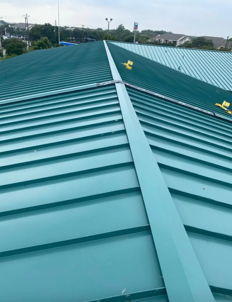 Green commercial metal roof ridge and valley for Metal Roof Repair in Lantana